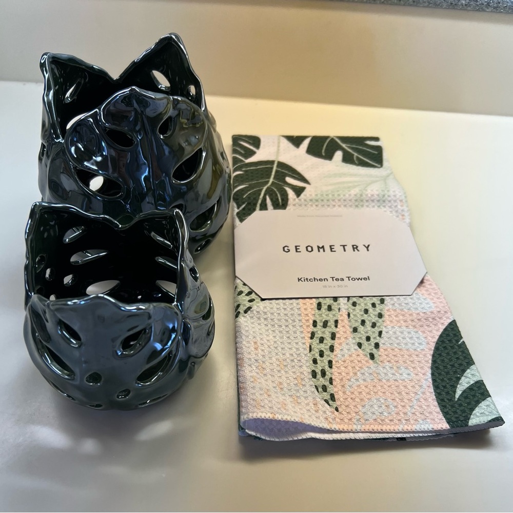 2 green leaf votives and one Geometry green leaf towel (new with tags)